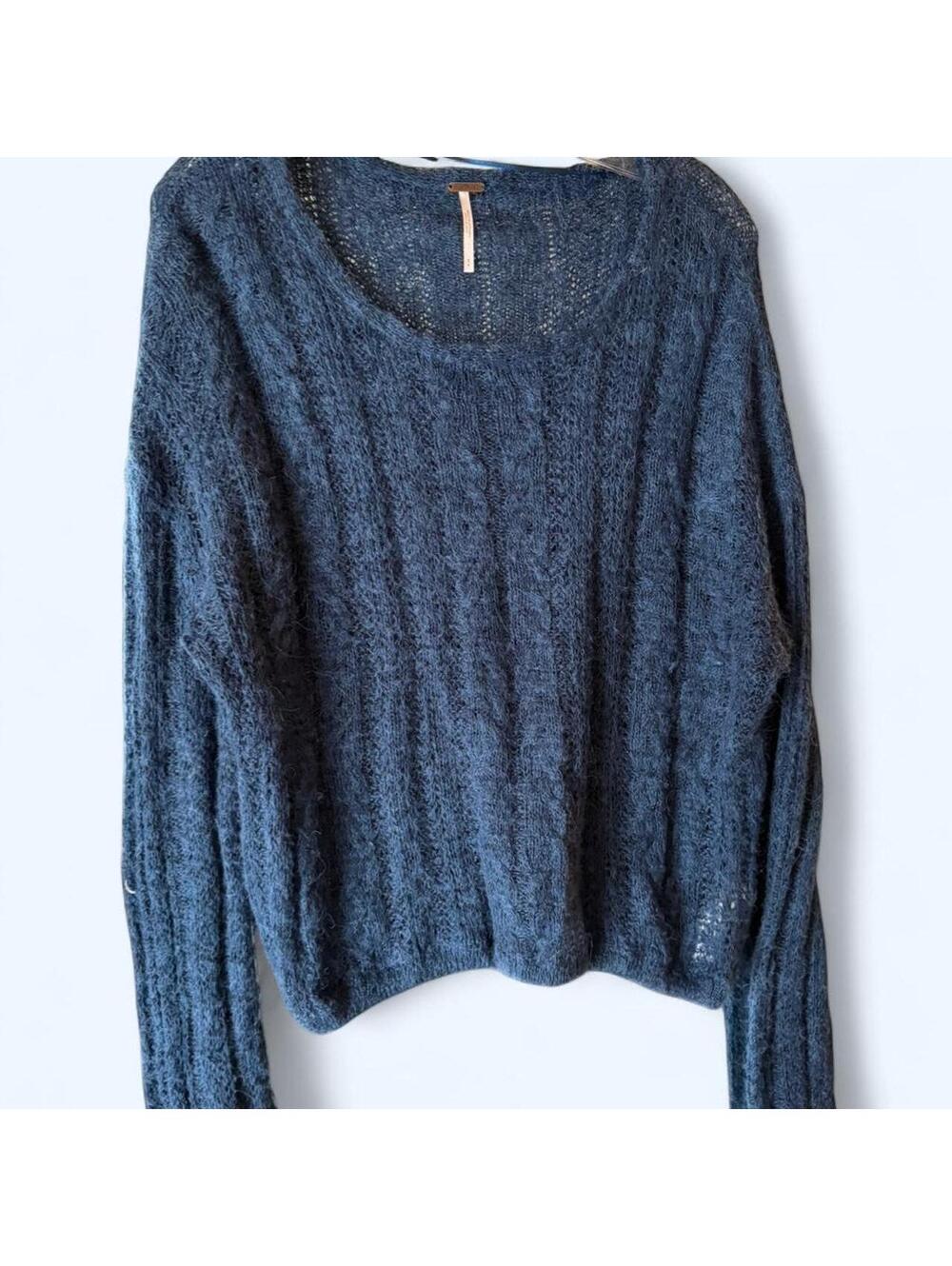 Free people blue cable knit sweater with a boho vibe